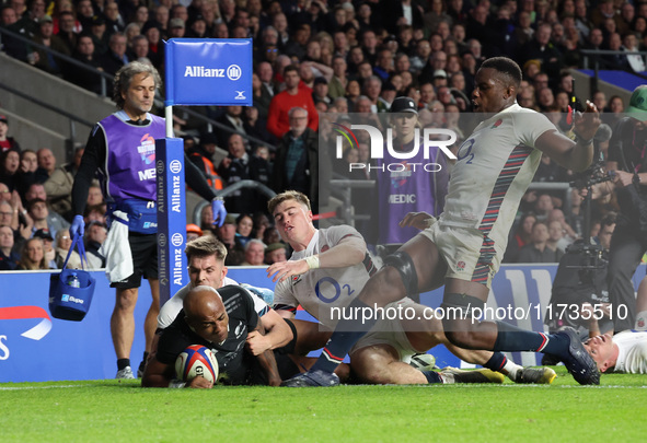 Mark Tele'a of New Zealand scores the winning try during the Autumn Nations Series International Rugby match between England and New Zealand...