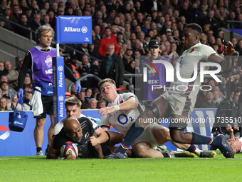 Mark Tele'a of New Zealand scores the winning try during the Autumn Nations Series International Rugby match between England and New Zealand...