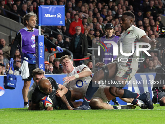 Mark Tele'a of New Zealand scores the winning try during the Autumn Nations Series International Rugby match between England and New Zealand...