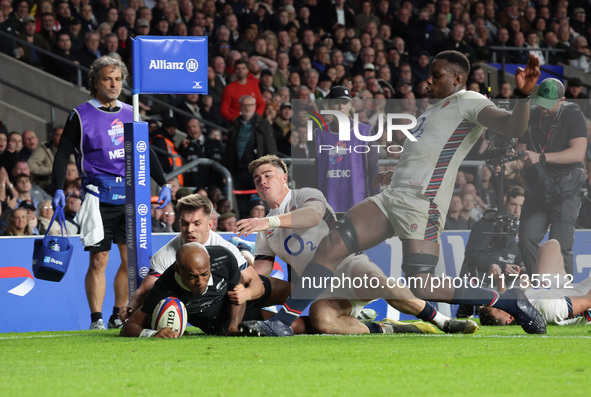 Mark Tele'a of New Zealand scores the winning try during the Autumn Nations Series International Rugby match between England and New Zealand...