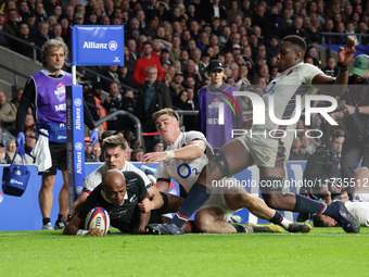 Mark Tele'a of New Zealand scores the winning try during the Autumn Nations Series International Rugby match between England and New Zealand...