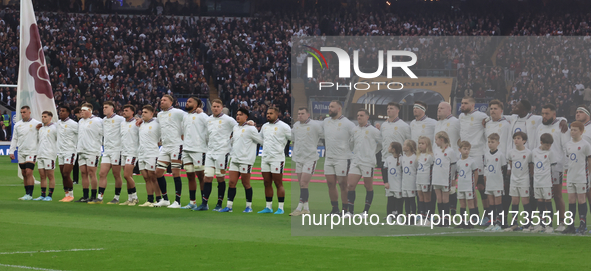 The England team stands before kickoff during the Autumn Nations Series International Rugby match between England and New Zealand at Allianz...