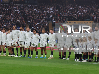 The England team stands before kickoff during the Autumn Nations Series International Rugby match between England and New Zealand at Allianz...