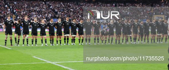 The New Zealand team stands before kickoff during the Autumn Nations Series International Rugby match between England and New Zealand at All...