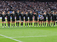 The New Zealand team stands before kickoff during the Autumn Nations Series International Rugby match between England and New Zealand at All...