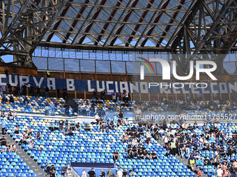 Supporters of S.S.C. Napoli attend the 11th day of the Serie A Championship between S.S.C. Napoli and Atalanta B.C. at the Diego Armando Mar...