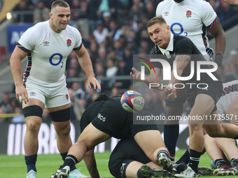 From left to right, England's George Martin (Leicester City) and Cortez Ratima of New Zealand are in action during the Autumn Nations Series...