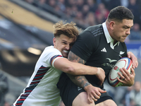 L-R: England's Henry Slade (Exeter Chiefs) tackles Tamaiti Williams of New Zealand during the Autumn Nations Series International Rugby matc...