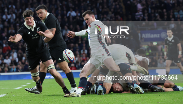 From left to right, Scott Barrett of New Zealand and Ben Spencer of England (Bath Rugby) are in action during the Autumn Nations Series Inte...