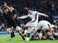 From left to right, Scott Barrett of New Zealand and Ben Spencer of England (Bath Rugby) are in action during the Autumn Nations Series Inte...