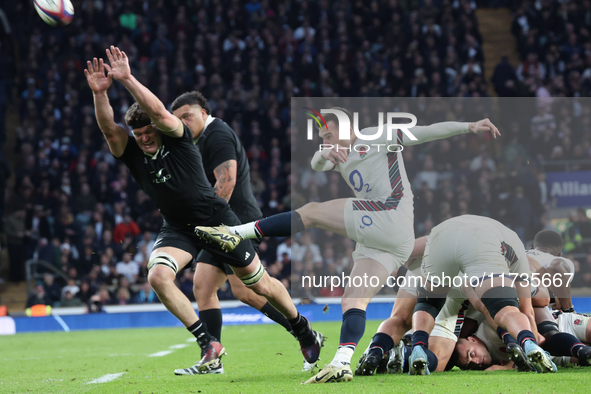 From left to right, Scott Barrett of New Zealand and Ben Spencer of England (Bath Rugby) are in action during the Autumn Nations Series Inte...