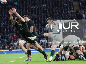 From left to right, Scott Barrett of New Zealand and Ben Spencer of England (Bath Rugby) are in action during the Autumn Nations Series Inte...