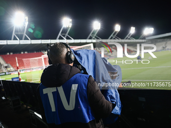 TV camera operator ahead of Puszcza Niepolomice - Lech Poznan match of the Ekstraklasa Polish Football League, at Cracovia Stadium in Krakow...