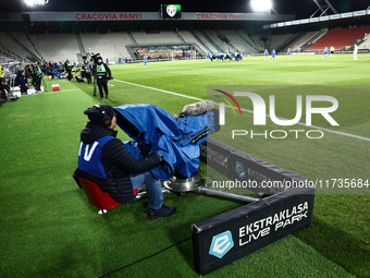 TV camera operator ahead of Puszcza Niepolomice - Lech Poznan match of the Ekstraklasa Polish Football League, at Cracovia Stadium in Krakow...