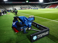 TV camera operator ahead of Puszcza Niepolomice - Lech Poznan match of the Ekstraklasa Polish Football League, at Cracovia Stadium in Krakow...