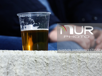 A plastic cup of beer is seen during Puszcza Niepolomice - Lech Poznan match of the Ekstraklasa Polish Football League, at Cracovia Stadium...