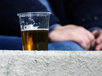 A plastic cup of beer is seen during Puszcza Niepolomice - Lech Poznan match of the Ekstraklasa Polish Football League, at Cracovia Stadium...