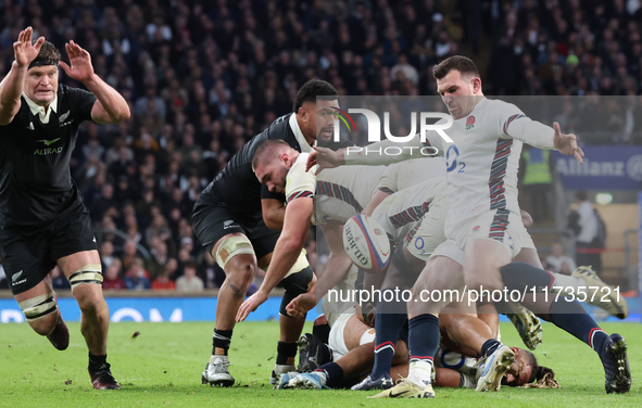 From left to right, Scott Barrett of New Zealand and Ben Spencer of England (Bath Rugby) are in action during the Autumn Nations Series Inte...