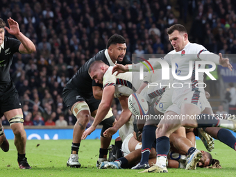 From left to right, Scott Barrett of New Zealand and Ben Spencer of England (Bath Rugby) are in action during the Autumn Nations Series Inte...