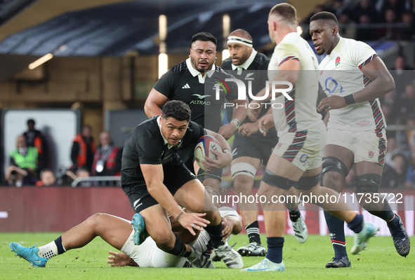 Caleb Clarke of New Zealand is in action during the Autumn Nations Series International Rugby match between England and New Zealand at Allia...