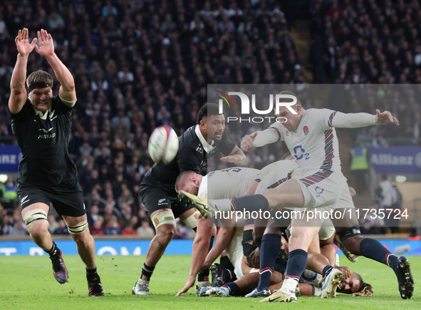 From left to right, Scott Barrett of New Zealand and Ben Spencer of England (Bath Rugby) are in action during the Autumn Nations Series Inte...