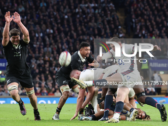 From left to right, Scott Barrett of New Zealand and Ben Spencer of England (Bath Rugby) are in action during the Autumn Nations Series Inte...