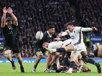 From left to right, Scott Barrett of New Zealand and Ben Spencer of England (Bath Rugby) are in action during the Autumn Nations Series Inte...