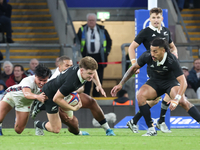 Jordie Barrett of New Zealand is tackled by England's Marcus Smith (Harlequins) during the Autumn Nations Series International Rugby match b...