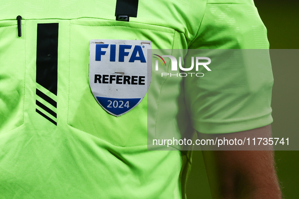 FIFA referee emblem is seen on a referee jersey during Puszcza Niepolomice - Lech Poznan match of the Ekstraklasa Polish Football League, at...