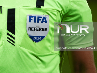 FIFA referee emblem is seen on a referee jersey during Puszcza Niepolomice - Lech Poznan match of the Ekstraklasa Polish Football League, at...