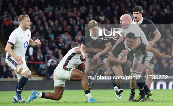 Anton Lienert-Brown of New Zealand is tackled by England's Dan Cole (Leicester Tigers) during the Autumn Nations Series International Rugby...