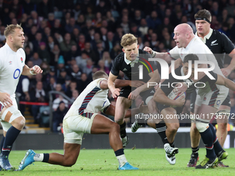 Anton Lienert-Brown of New Zealand is tackled by England's Dan Cole (Leicester Tigers) during the Autumn Nations Series International Rugby...