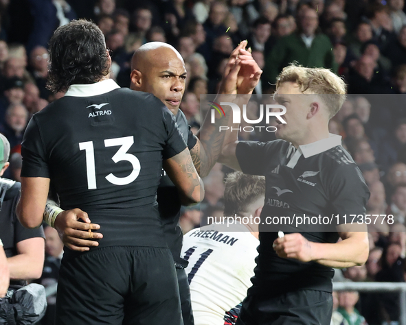 Mark Tele'a of New Zealand celebrates his try during the Autumn Nations Series International Rugby match between England and New Zealand at...