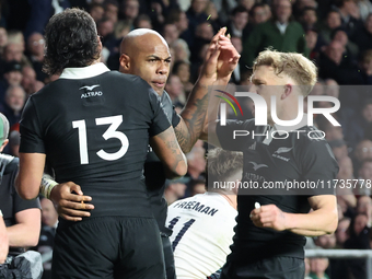 Mark Tele'a of New Zealand celebrates his try during the Autumn Nations Series International Rugby match between England and New Zealand at...