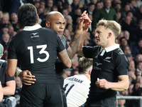 Mark Tele'a of New Zealand celebrates his try during the Autumn Nations Series International Rugby match between England and New Zealand at...