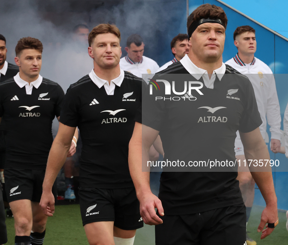 From left to right, Beauden Barrett of New Zealand, Jordie Barrett of New Zealand, and Scott Barrett of New Zealand (brothers) participate i...