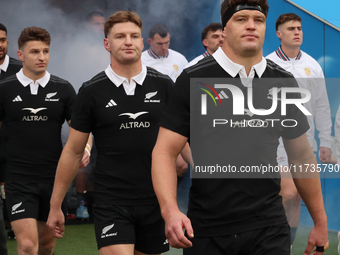 From left to right, Beauden Barrett of New Zealand, Jordie Barrett of New Zealand, and Scott Barrett of New Zealand (brothers) participate i...