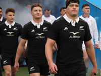 From left to right, Beauden Barrett of New Zealand, Jordie Barrett of New Zealand, and Scott Barrett of New Zealand (brothers) participate i...