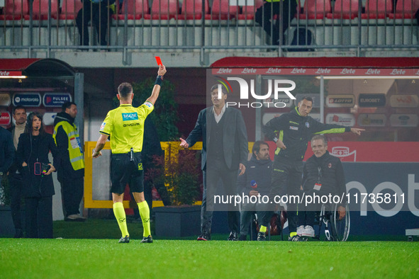 Ermanno Feliciani, the referee, shows the red card during the AC Monza vs AC Milan Serie A match at U-Power Stadium in Monza, Italy, on Nove...