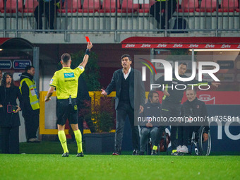 Ermanno Feliciani, the referee, shows the red card during the AC Monza vs AC Milan Serie A match at U-Power Stadium in Monza, Italy, on Nove...