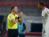 Ermanno Feliciani serves as the referee during the AC Monza vs AC Milan Serie A match at U-Power Stadium in Monza, Italy, on November 2, 202...