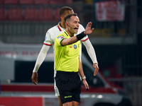 Ermanno Feliciani serves as the referee during the AC Monza vs AC Milan Serie A match at U-Power Stadium in Monza, Italy, on November 2, 202...