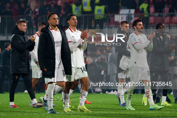 The team of AC Milan celebrates their win during the match between AC Monza and AC Milan in Serie A at U-Power Stadium in Monza, Italy, on N...