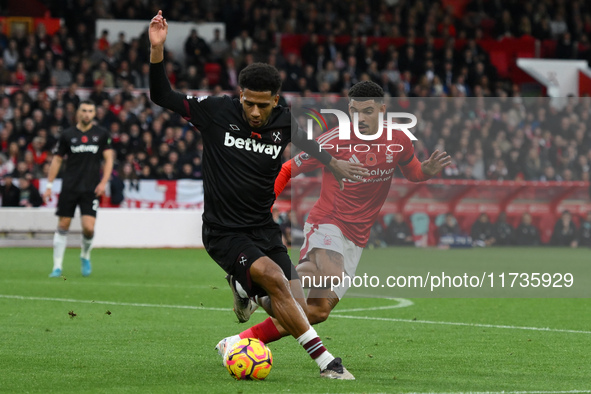 Jean-Clair Todibo of West Ham United is under pressure from Morgan Gibbs-White of Nottingham Forest during the Premier League match between...