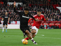 Jean-Clair Todibo of West Ham United is under pressure from Morgan Gibbs-White of Nottingham Forest during the Premier League match between...