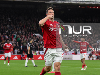 Chris Wood of Nottingham Forest celebrates after scoring a goal to make it 1-0 during the Premier League match between Nottingham Forest and...