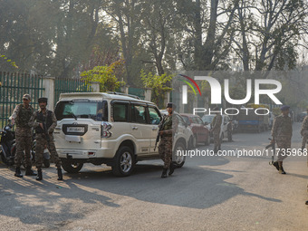 Indian security personnel stand near the site of a grenade blast at a marketplace in Srinagar, Jammu and Kashmir, on November 3, 2024. At le...