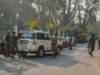 Indian security personnel stand near the site of a grenade blast at a marketplace in Srinagar, Jammu and Kashmir, on November 3, 2024. At le...