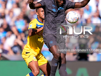 Romelu Lukaku of SSC Napoli and Isak Hien of Atalanta BC compete for the ball during the serie Serie A Enilive match between SSC Napoli and...