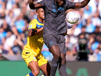 Romelu Lukaku of SSC Napoli and Isak Hien of Atalanta BC compete for the ball during the serie Serie A Enilive match between SSC Napoli and...